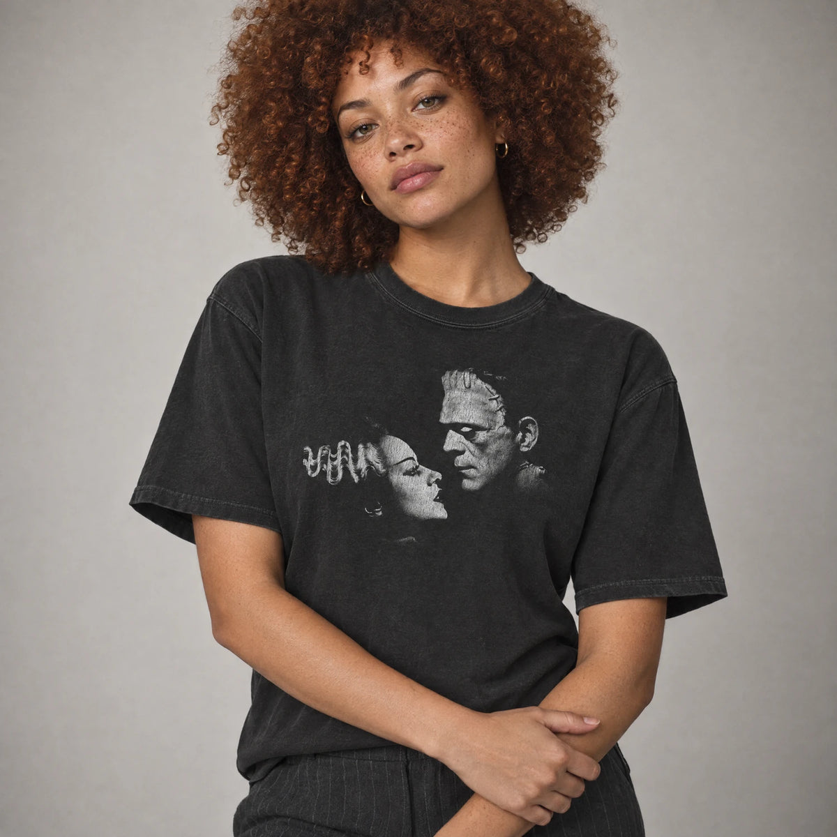 Frankenstein and Bride of Frankenstein classic monster tee on a model, black