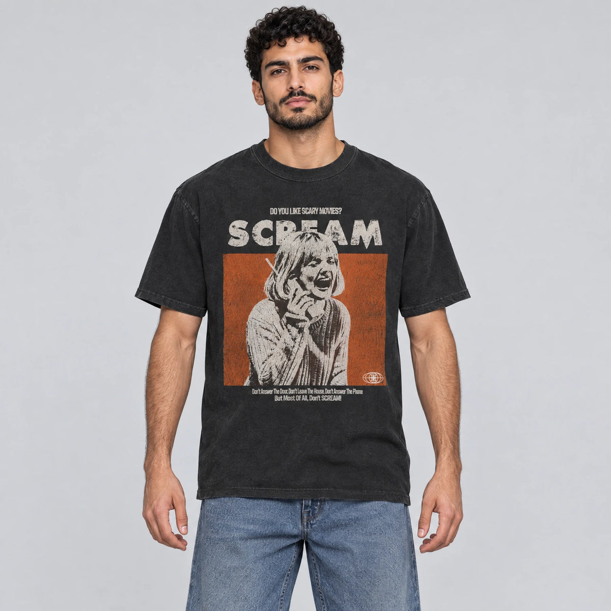 Wrong number 90s slasher phone terror graphic tee on a model, black